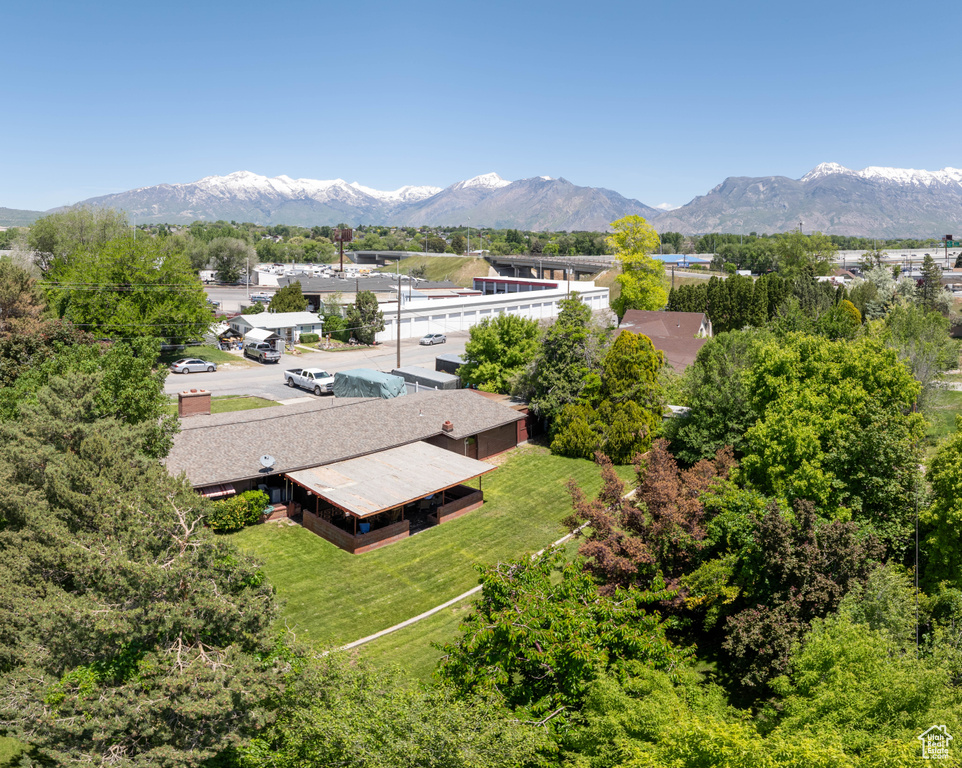 View from above of property with a mountain backdrop