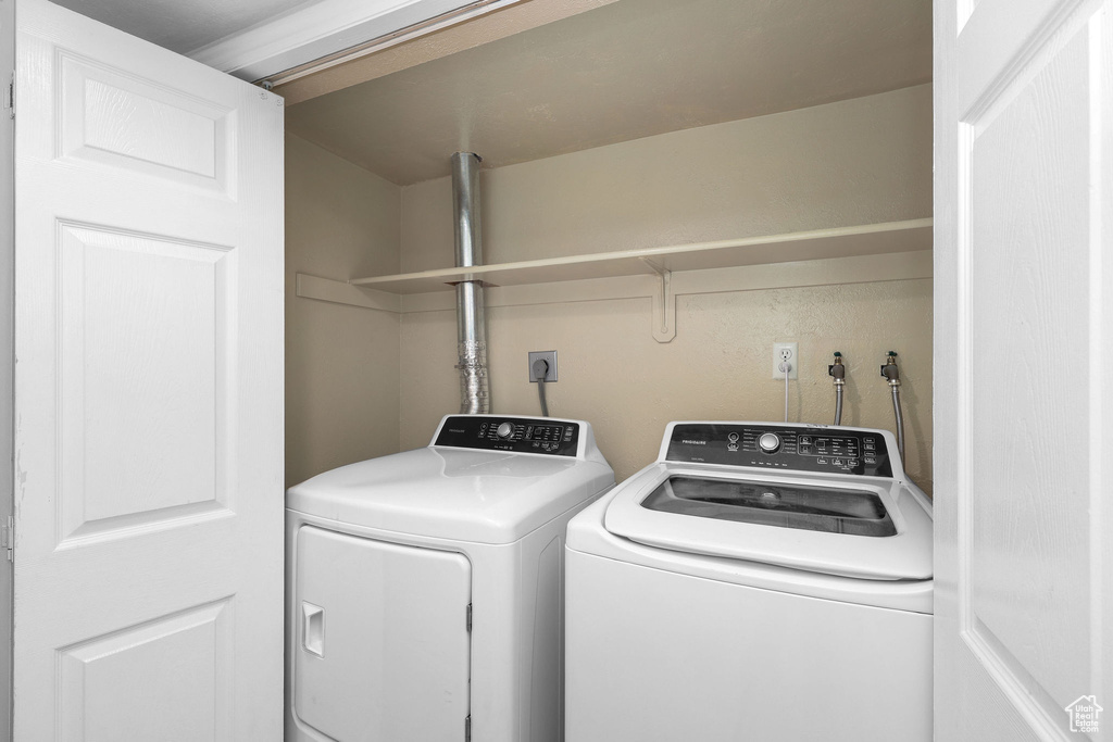 Laundry area featuring independent washer and dryer