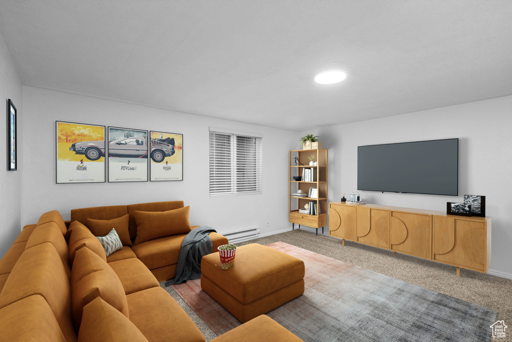 Carpeted living area featuring baseboards and baseboard heating