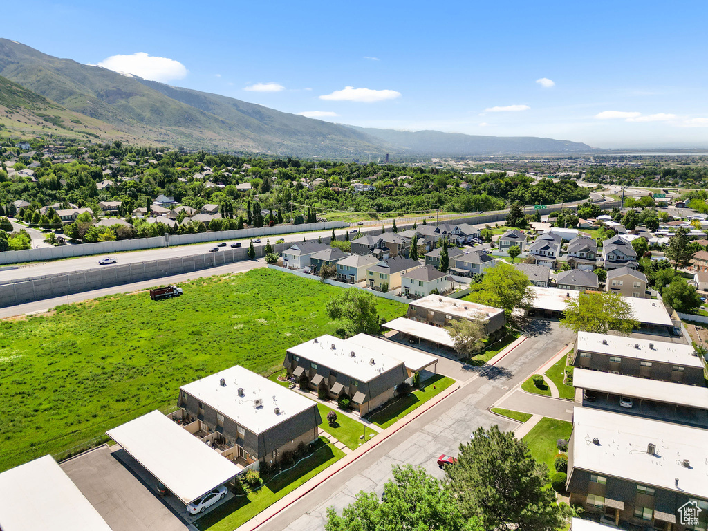 Aerial view of residential area with a mountain backdrop