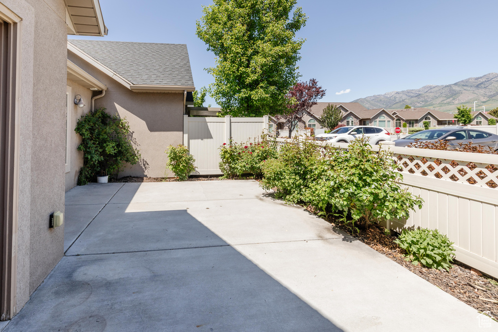 View of patio with a mountain view and a residential view