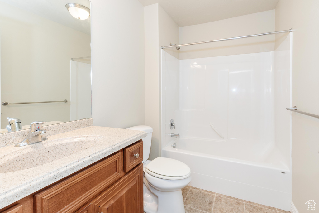 Full bath featuring vanity, toilet, and bathing tub / shower combination