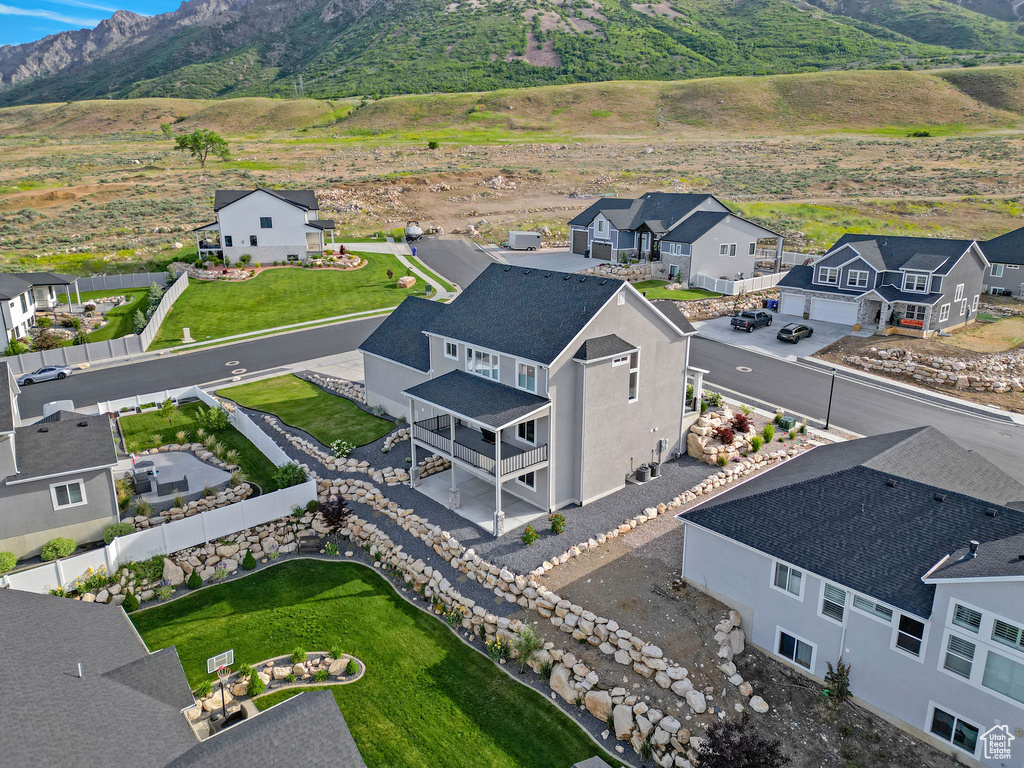 Aerial view of residential area with a mountainous background