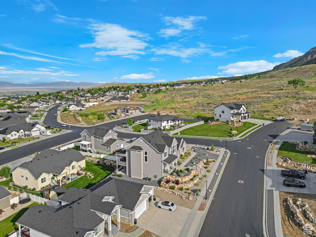 Aerial view of residential area with a mountainous background