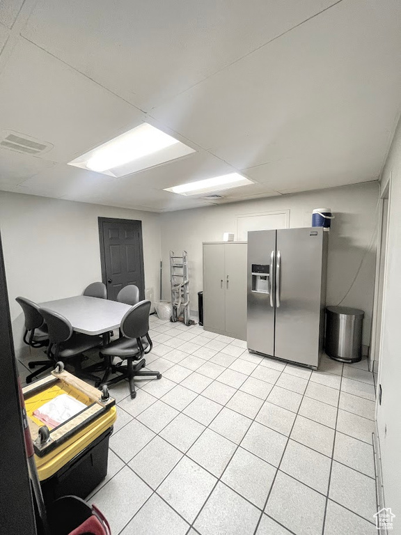 Office featuring light tile patterned floors