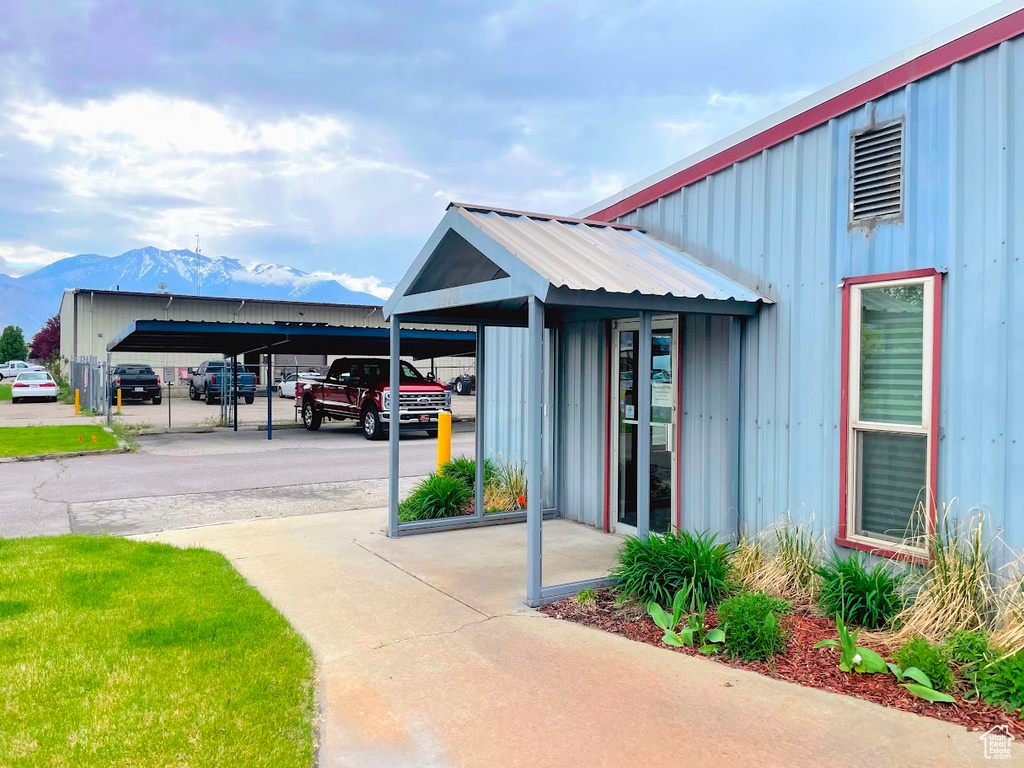 View of building exterior featuring a mountain view