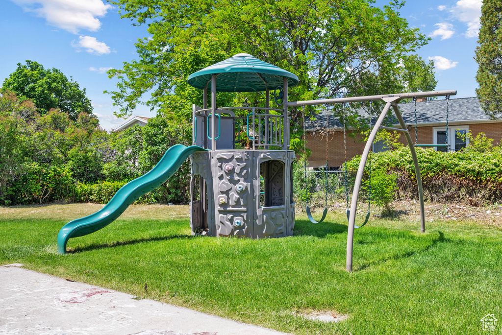 Communal playground featuring a lawn