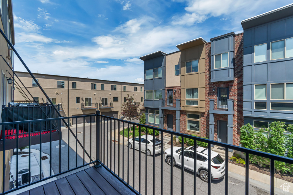 Balcony featuring a residential view