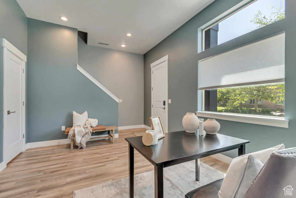 Office featuring wood finished floors, recessed lighting, and baseboards