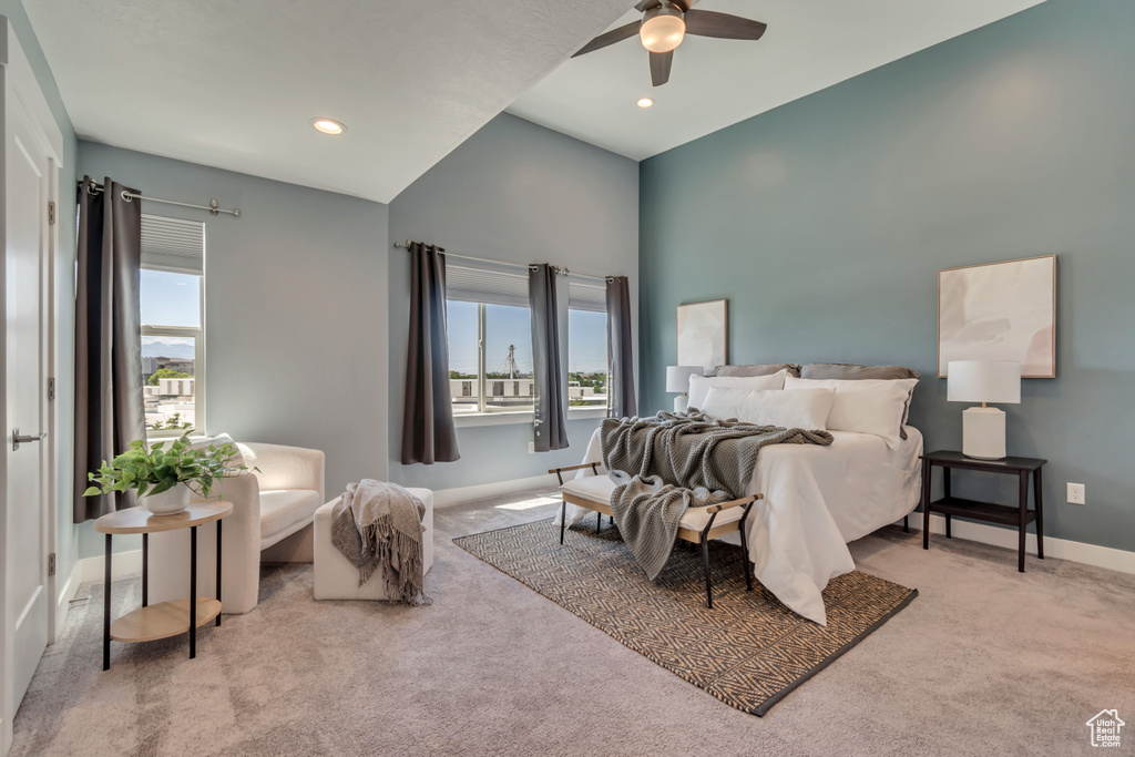 Bedroom with carpet flooring, multiple windows, baseboards, ceiling fan, and recessed lighting