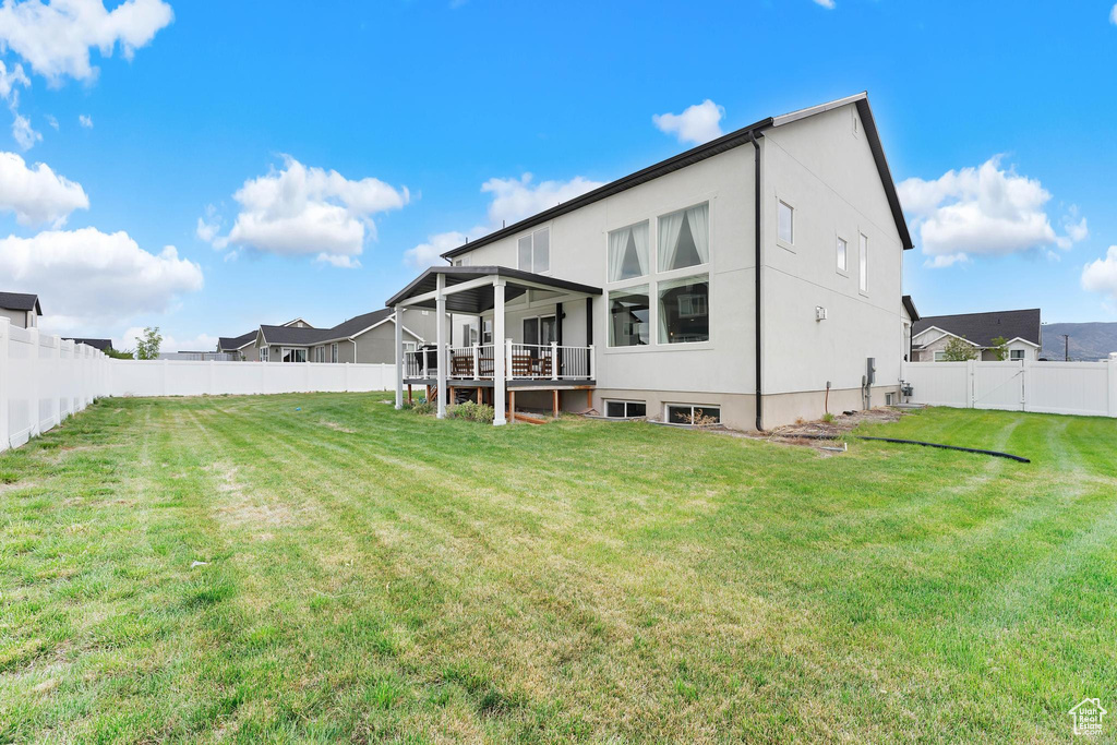 Back of property with stucco siding