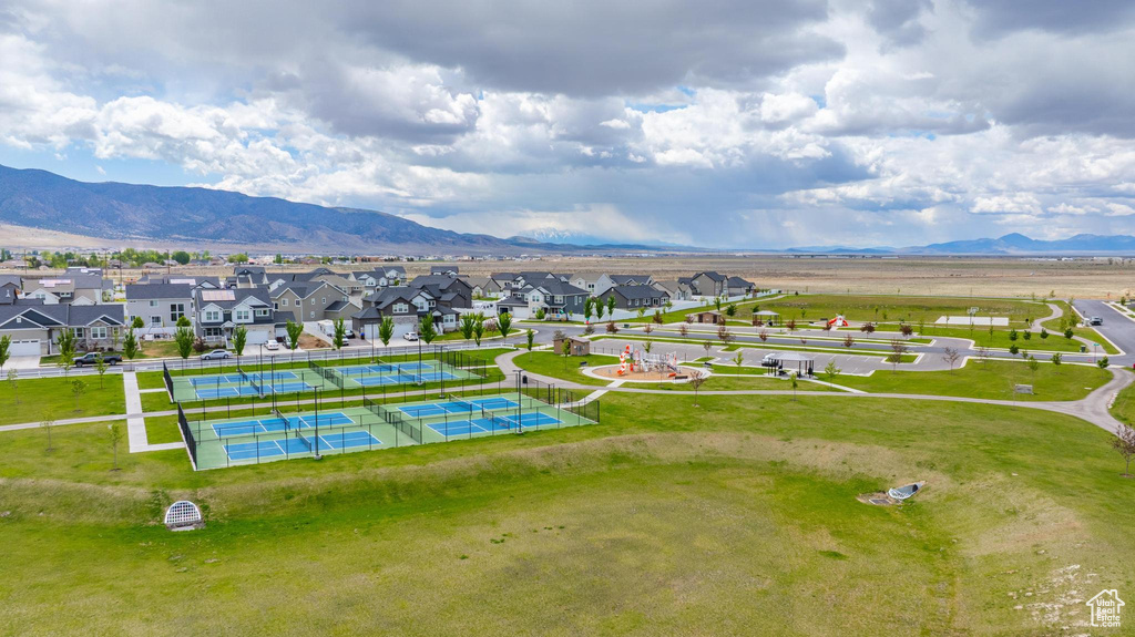 Aerial view of residential area with a mountain backdrop