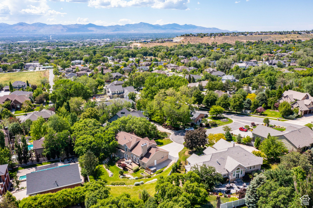 Aerial perspective of suburban area featuring mountains