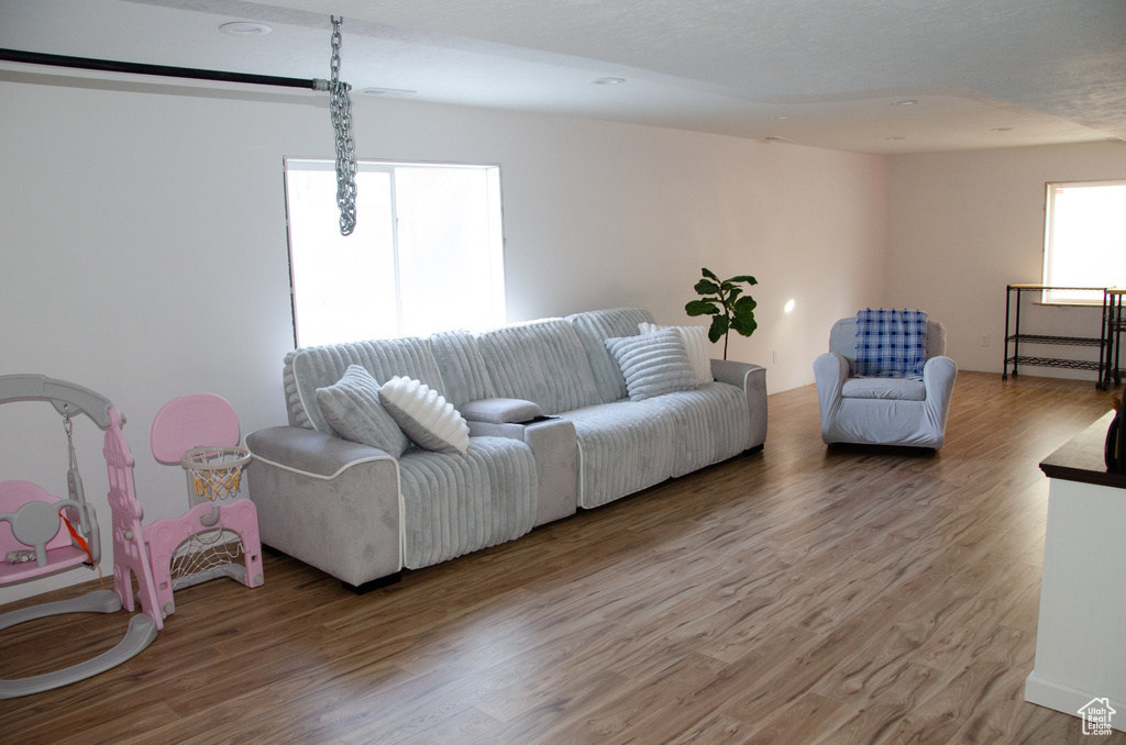 Living area with light wood-style flooring