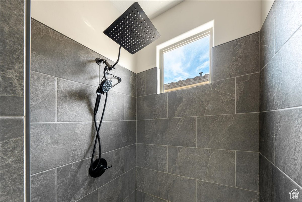 Bathroom view of a tile shower