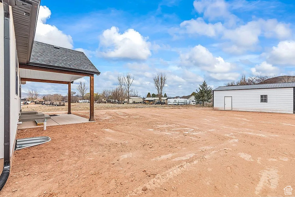 View of yard featuring a patio area