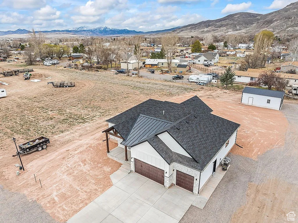 Aerial view of residential area with a mountain backdrop