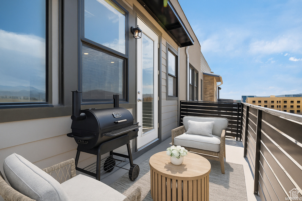 Balcony featuring a grill