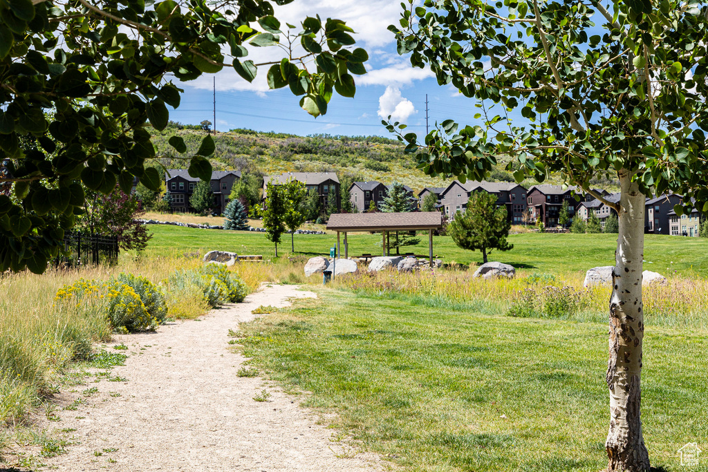 View of home's community featuring a lawn, a gazebo, and a residential view