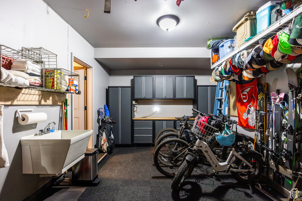 Garage featuring a sink
