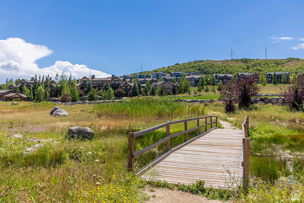 View of mountain background featuring nearby suburban area
