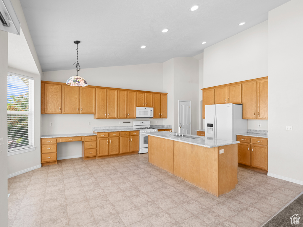 Kitchen featuring white appliances, high vaulted ceiling, baseboards, light countertops, and a sink