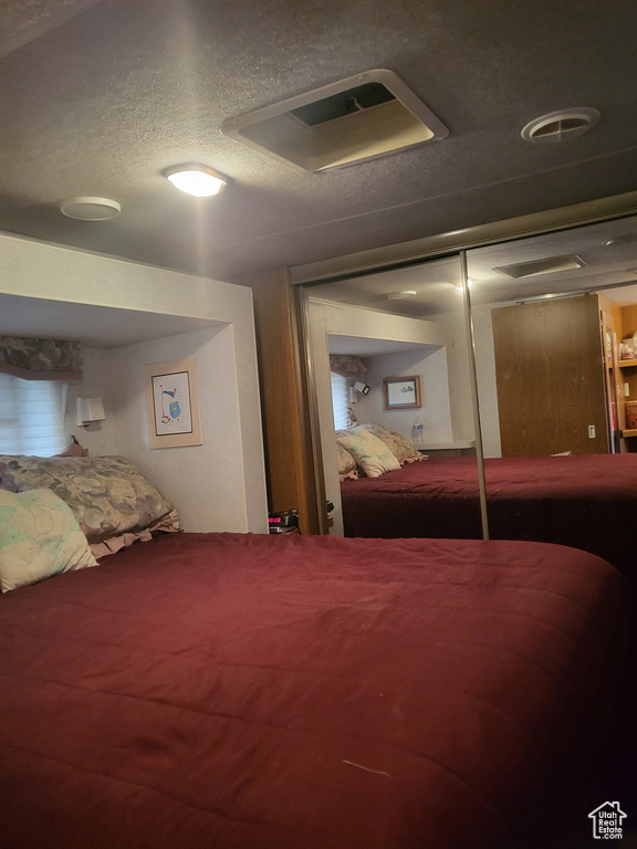 Bedroom featuring a closet