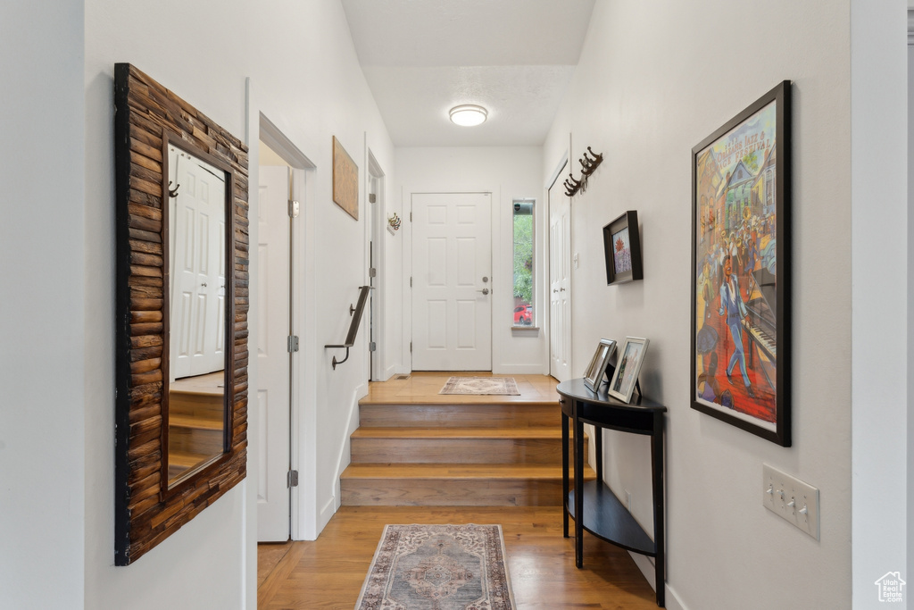 Entryway featuring light wood finished floors and baseboards