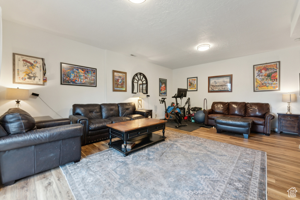 Living area with wood finished floors