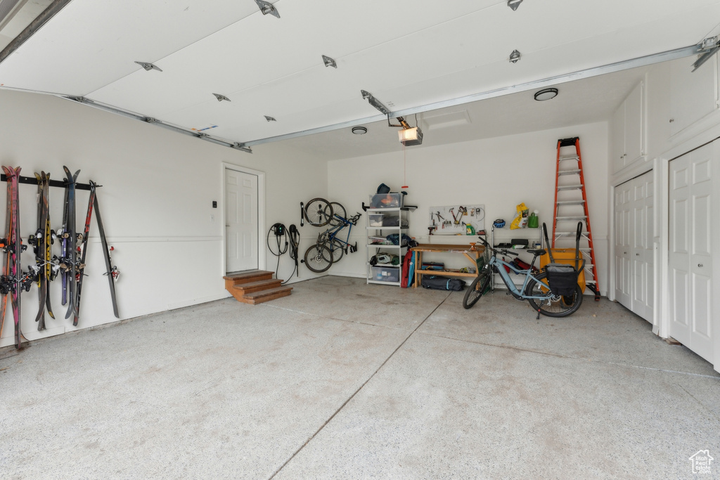 Garage featuring a garage door opener