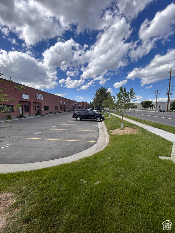 View of asphalt road with curbs