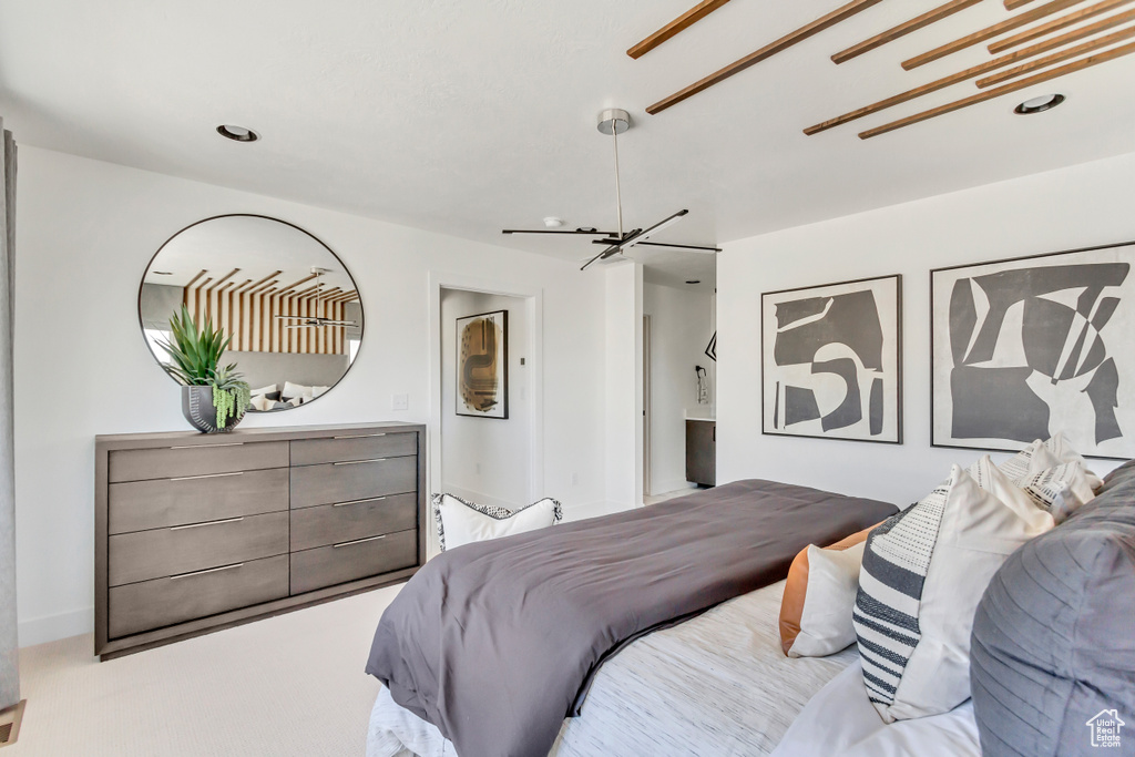 Bedroom featuring a chandelier