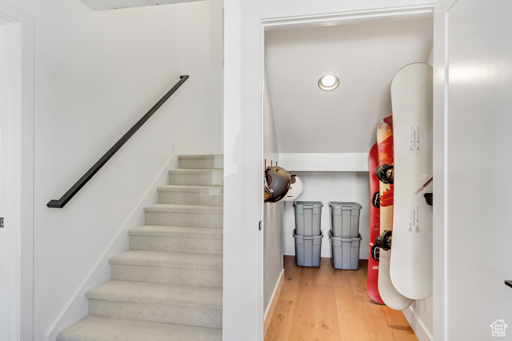 Staircase with wood finished floors