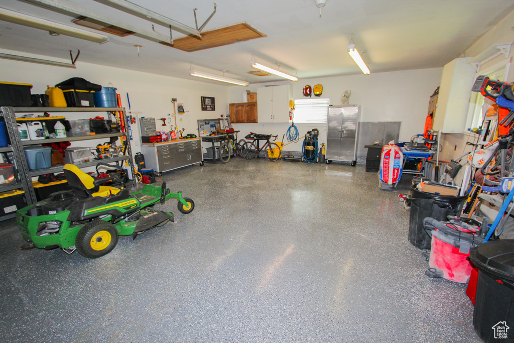 Garage featuring a workshop area