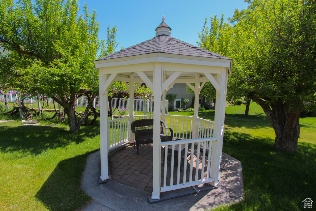 View of green lawn featuring a gazebo