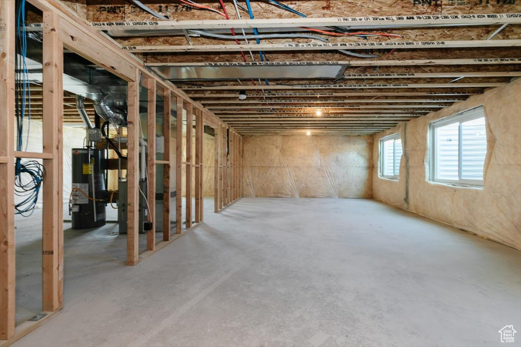Basement featuring water heater