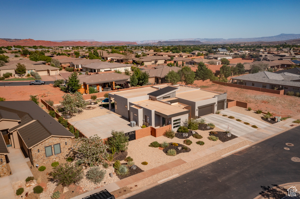 Aerial view of residential area with mountains