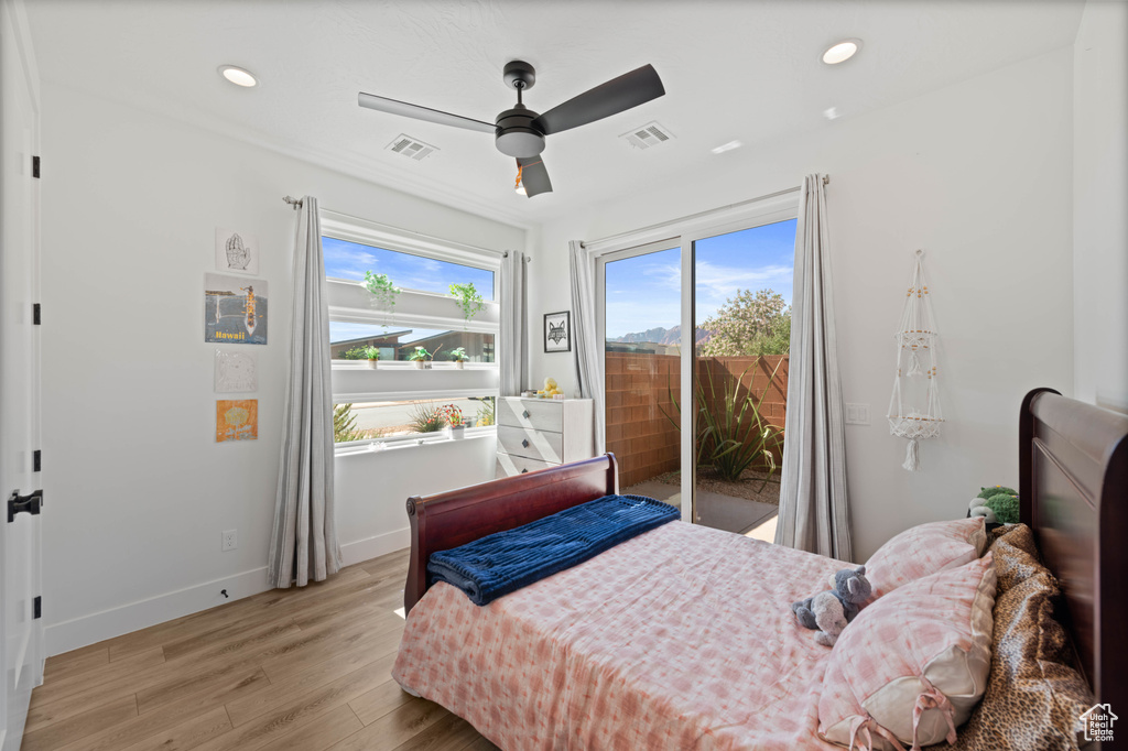 Bedroom with access to exterior, light wood finished floors, baseboards, recessed lighting, and a ceiling fan