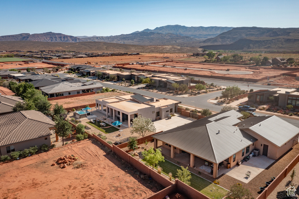 Aerial view of residential area with mountains