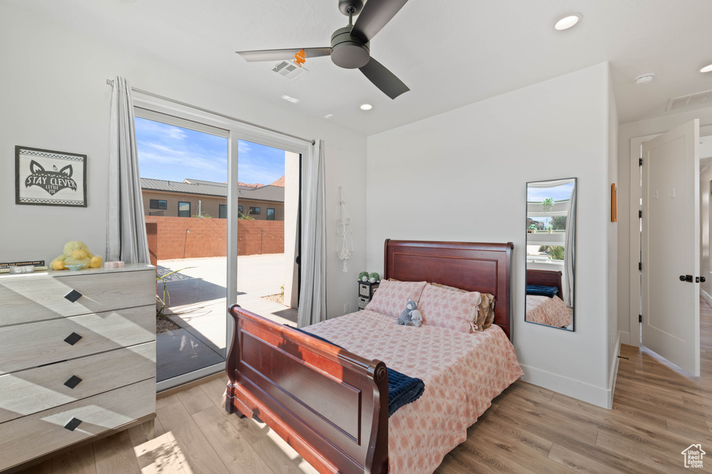 Bedroom with access to exterior, light wood-style floors, recessed lighting, baseboards, and ceiling fan