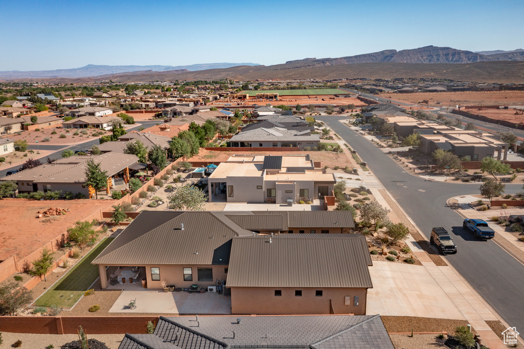 Aerial perspective of suburban area featuring mountains