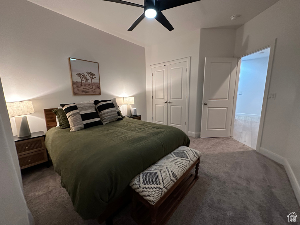 Bedroom featuring carpet flooring, a closet, baseboards, and a ceiling fan