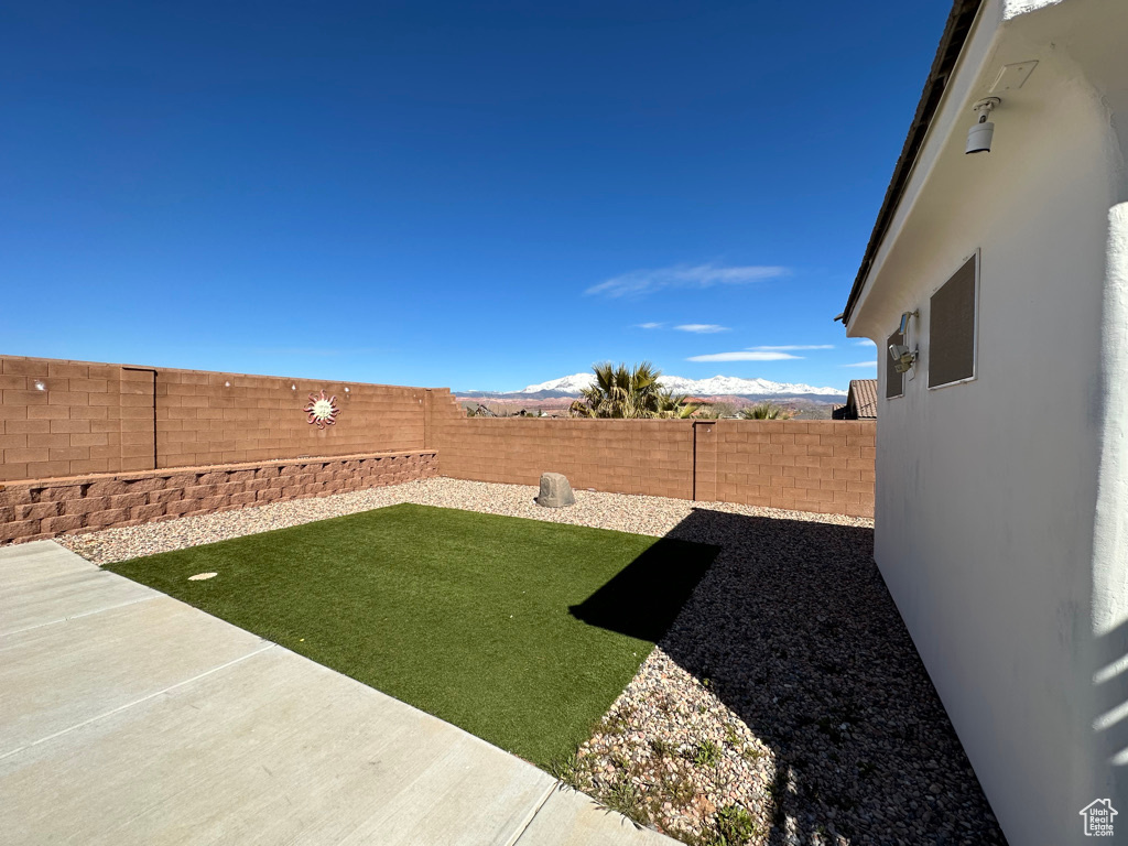View of yard with a patio