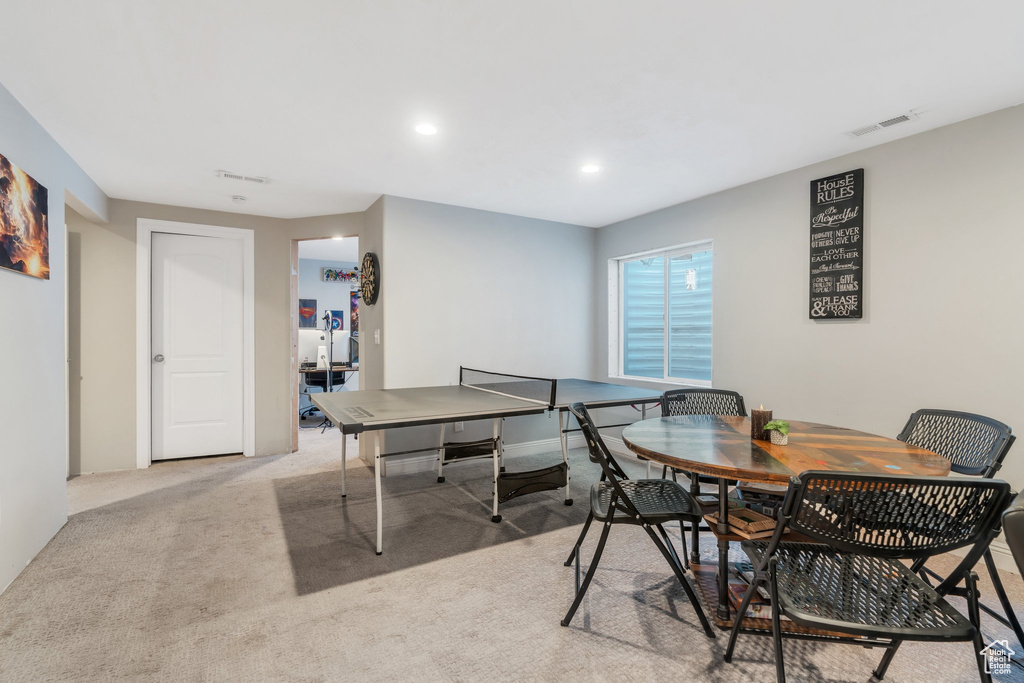 Rec room featuring light carpet and recessed lighting