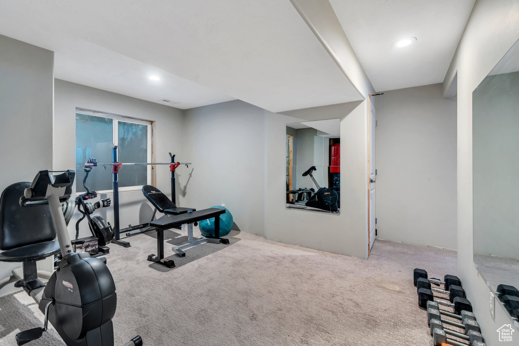 Exercise area featuring carpet and recessed lighting