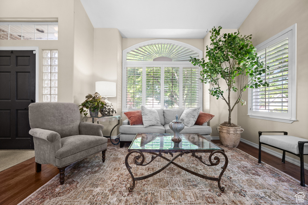 Living area featuring wood finished floors and baseboards