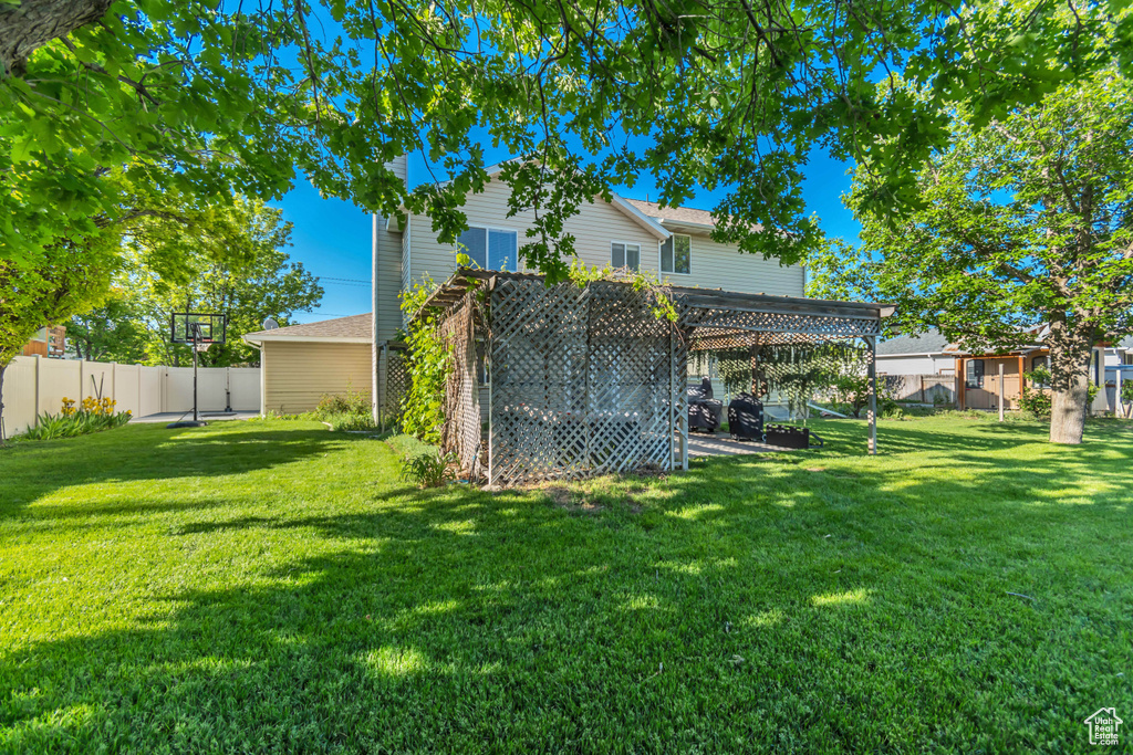 View of yard with a pergola