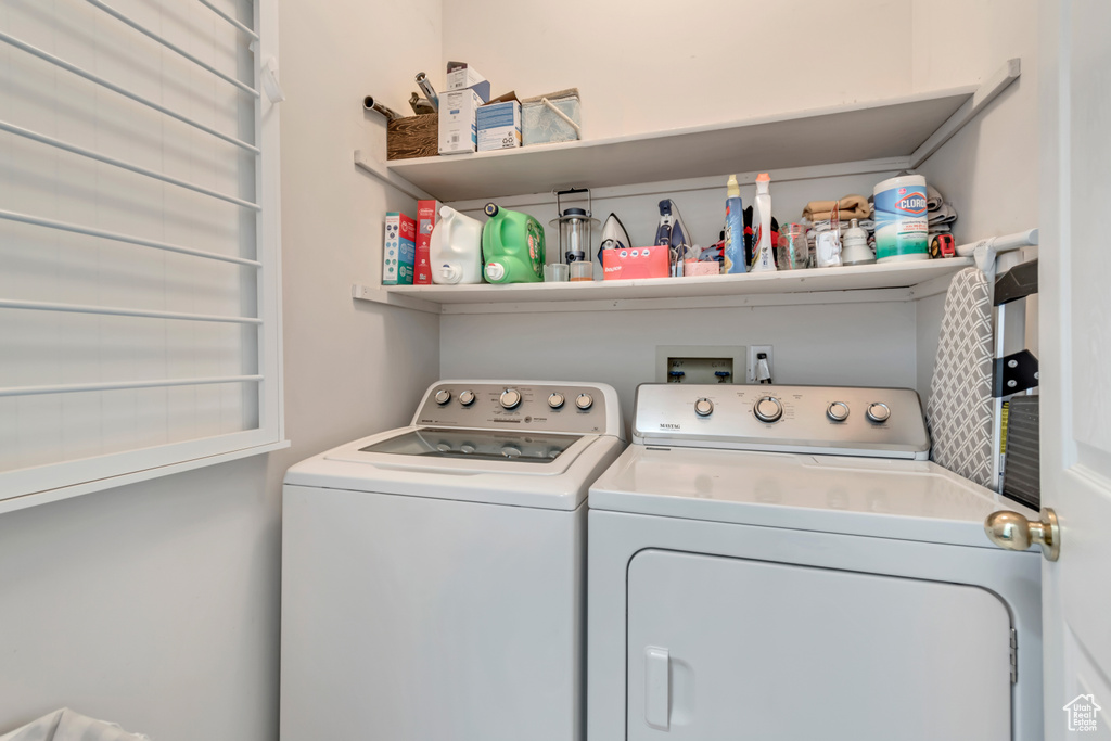 Washroom with washing machine and dryer