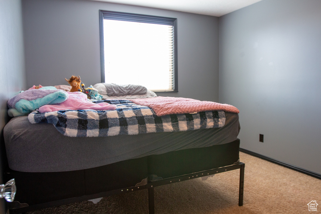 Bedroom with carpet