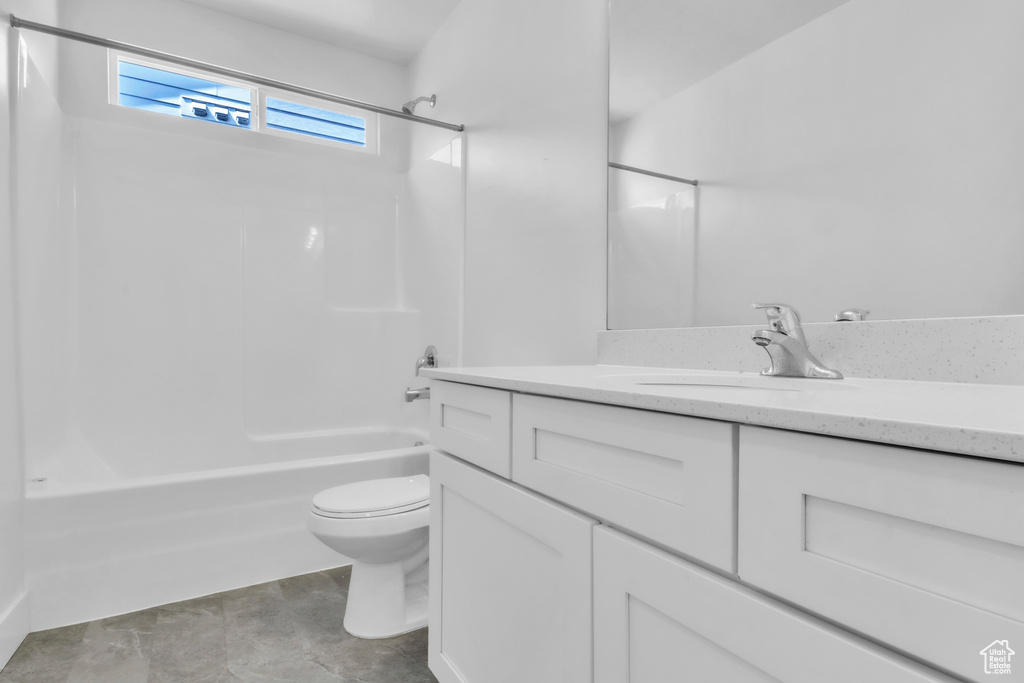 Full bath featuring vanity, toilet, and tub / shower combination